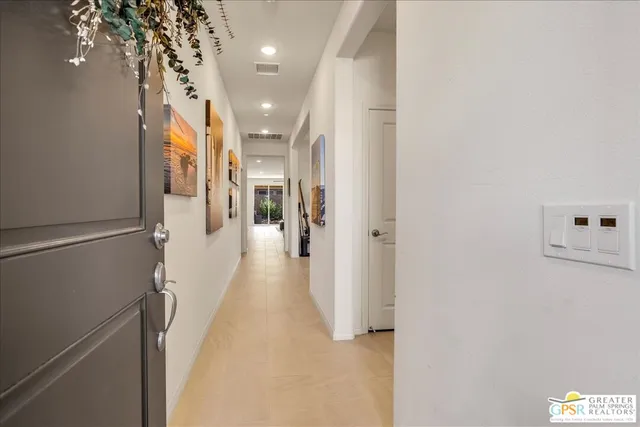 a view of multiple houses with a city street