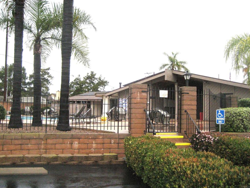 1175 La Moree Road, Unit 33 San Marcos, CA 92078 - Photo 2 of 18 front view of a house with a yard