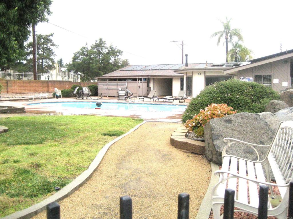 1175 La Moree Road, Unit 33 San Marcos, CA 92078 - Photo 3 of 18 a front view of house with yard and seating area