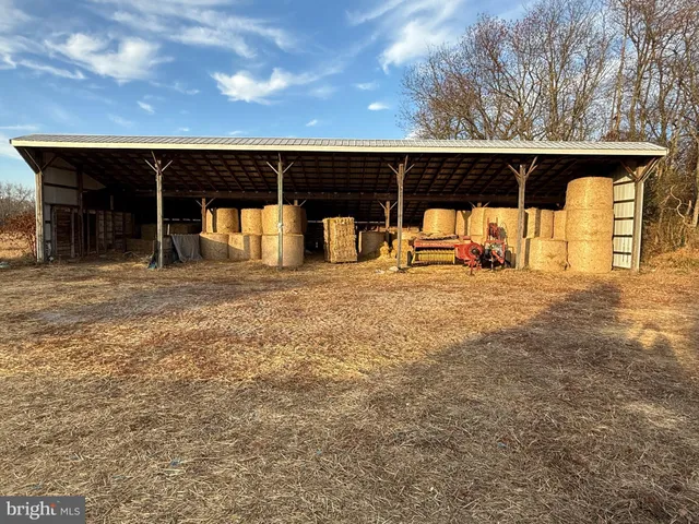 a view of a lake with houses in the back