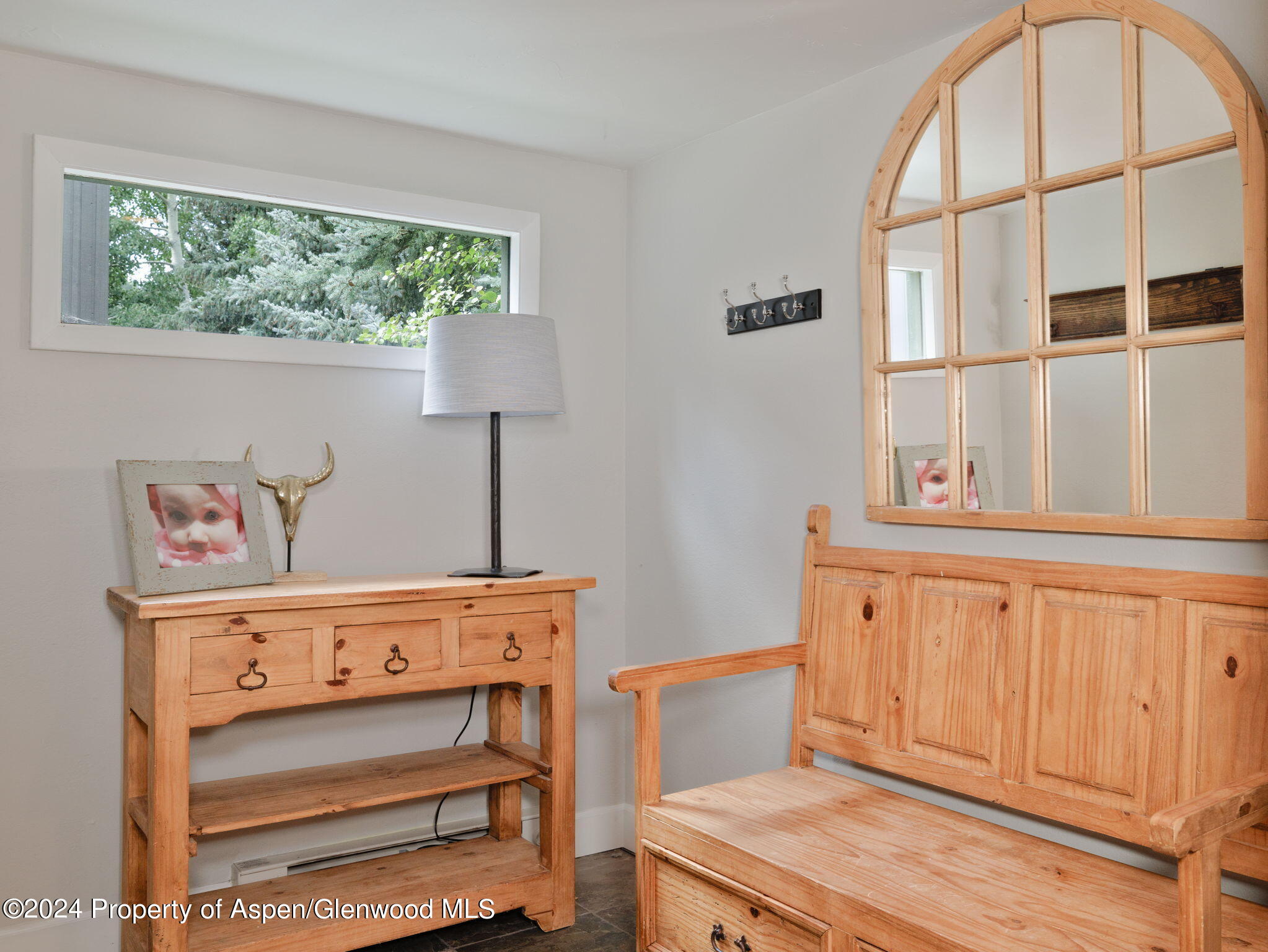 383 Meadow Ranch Road, Unit F4C Snowmass Village, CO 81615 - Photo 7 of 16 a bedroom with a bed and a window