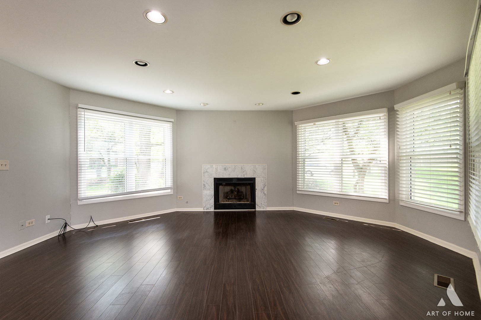 61 Willow Parkway, Unit 61 Buffalo Grove, IL 60089 - Photo 9 of 34 wooden floor in an empty room with a window