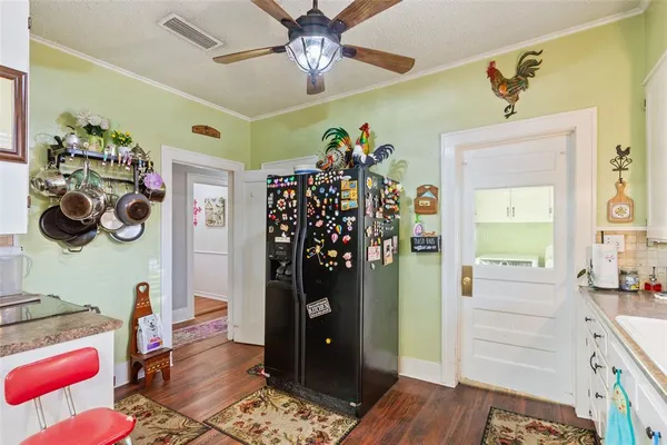 a view of a entryway door and hallway