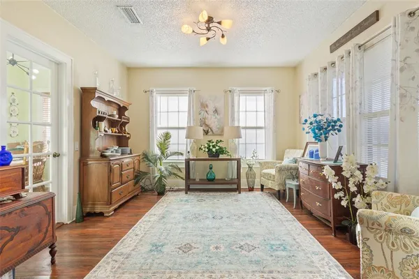 a living room with furniture or couch and a window