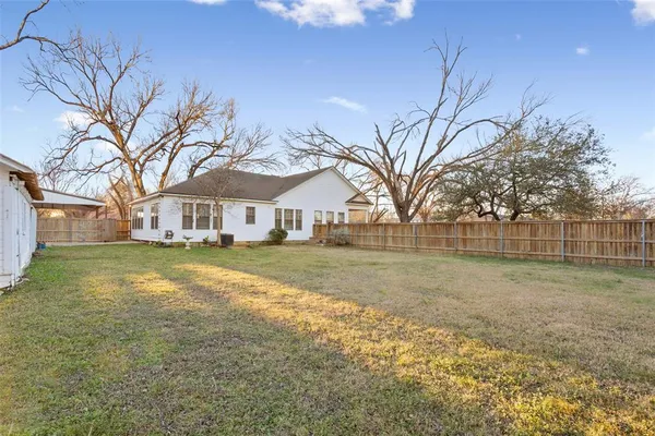 a view of house with outdoor space and street view
