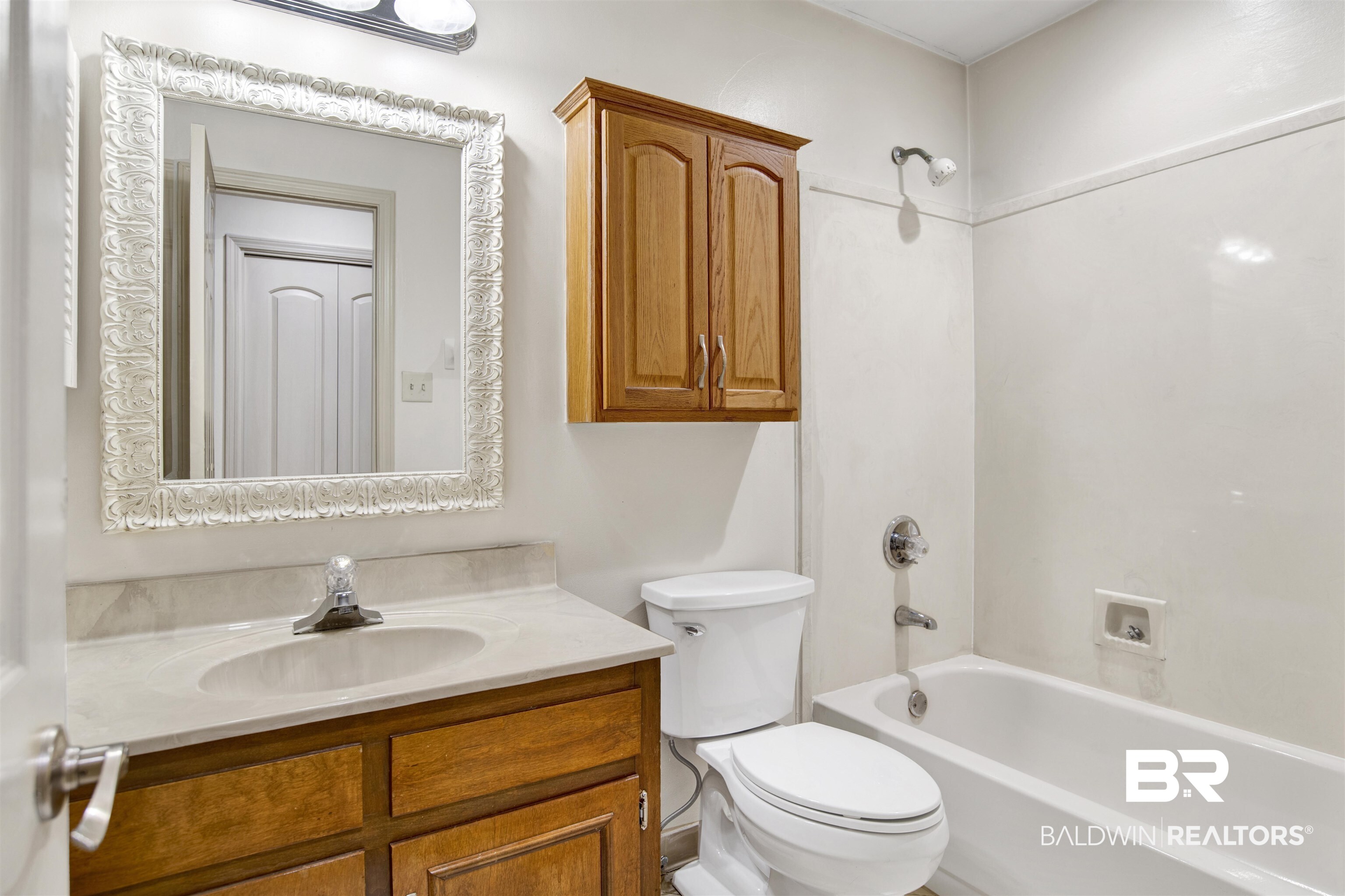 3412 Peyton Court Mobile, AL 36695 - Photo 24 of 27 Full bathroom with vanity, shower combination, and toilet