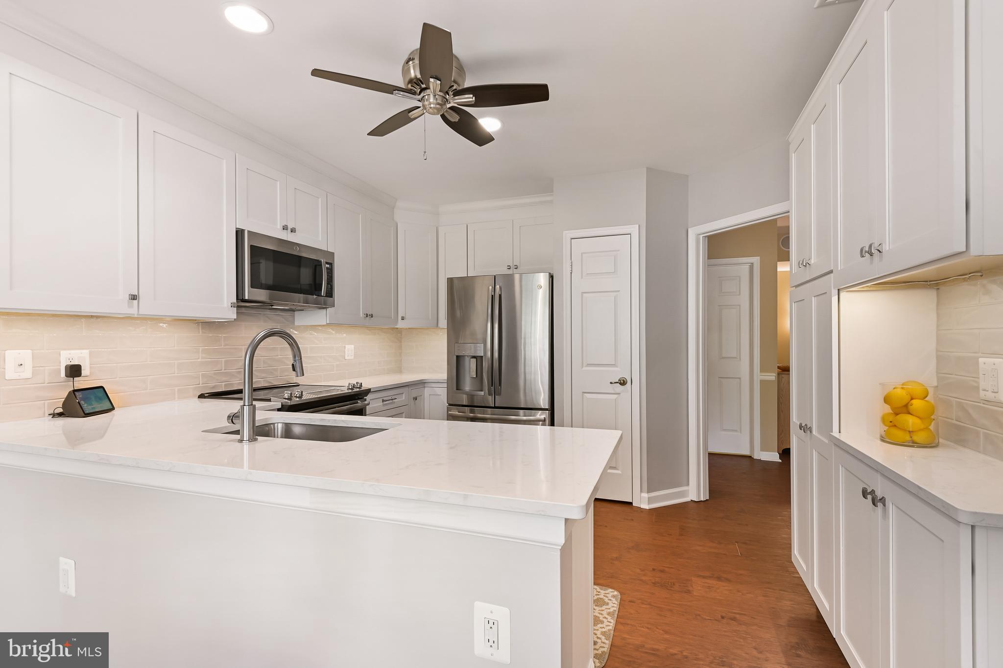 416 Rockfleet Road, Unit 202 Lutherville-Timonium, MD 21093 - Photo 8 of 30 Quartz Kitchen Peninsula