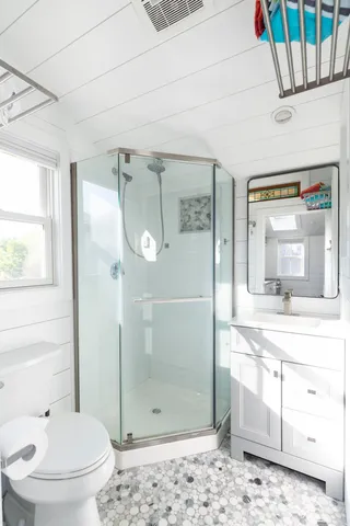 a picture of a wall with a shower