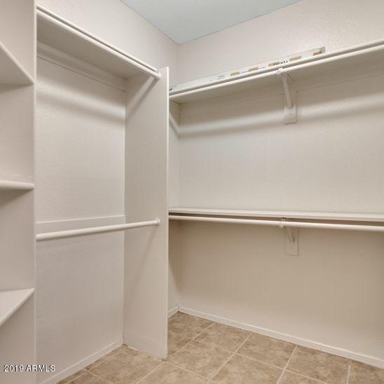 3848 North 3rd Avenue, Unit 1086 Phoenix, AZ 85013 - Photo 16 of 35 a view of an empty walk in closet