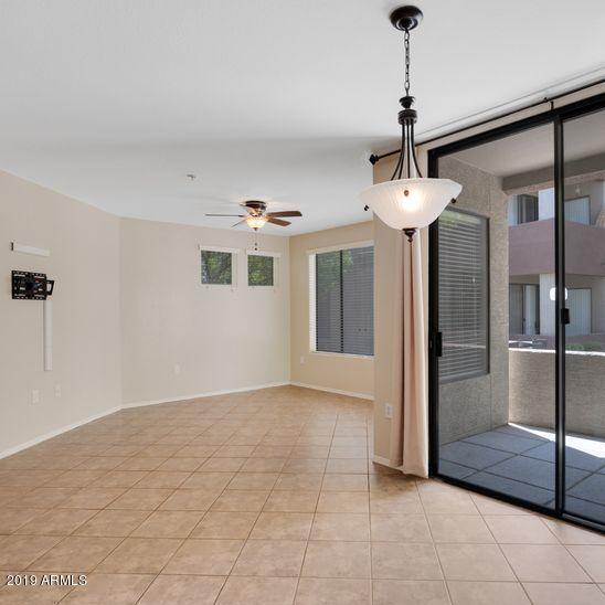 3848 North 3rd Avenue, Unit 1086 Phoenix, AZ 85013 - Photo 2 of 35 a view of an empty room and kitchen