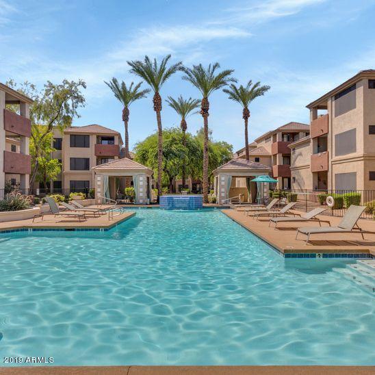 3848 North 3rd Avenue, Unit 1086 Phoenix, AZ 85013 - Photo 22 of 35 a front view of multiple houses with yard