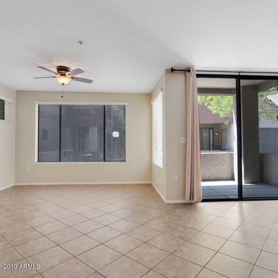 3848 North 3rd Avenue, Unit 1086 Phoenix, AZ 85013 - Photo 3 of 35 a view of an empty room with a window