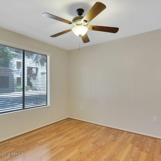 3848 North 3rd Avenue, Unit 1086 Phoenix, AZ 85013 - Photo 10 of 35 an empty room with a window