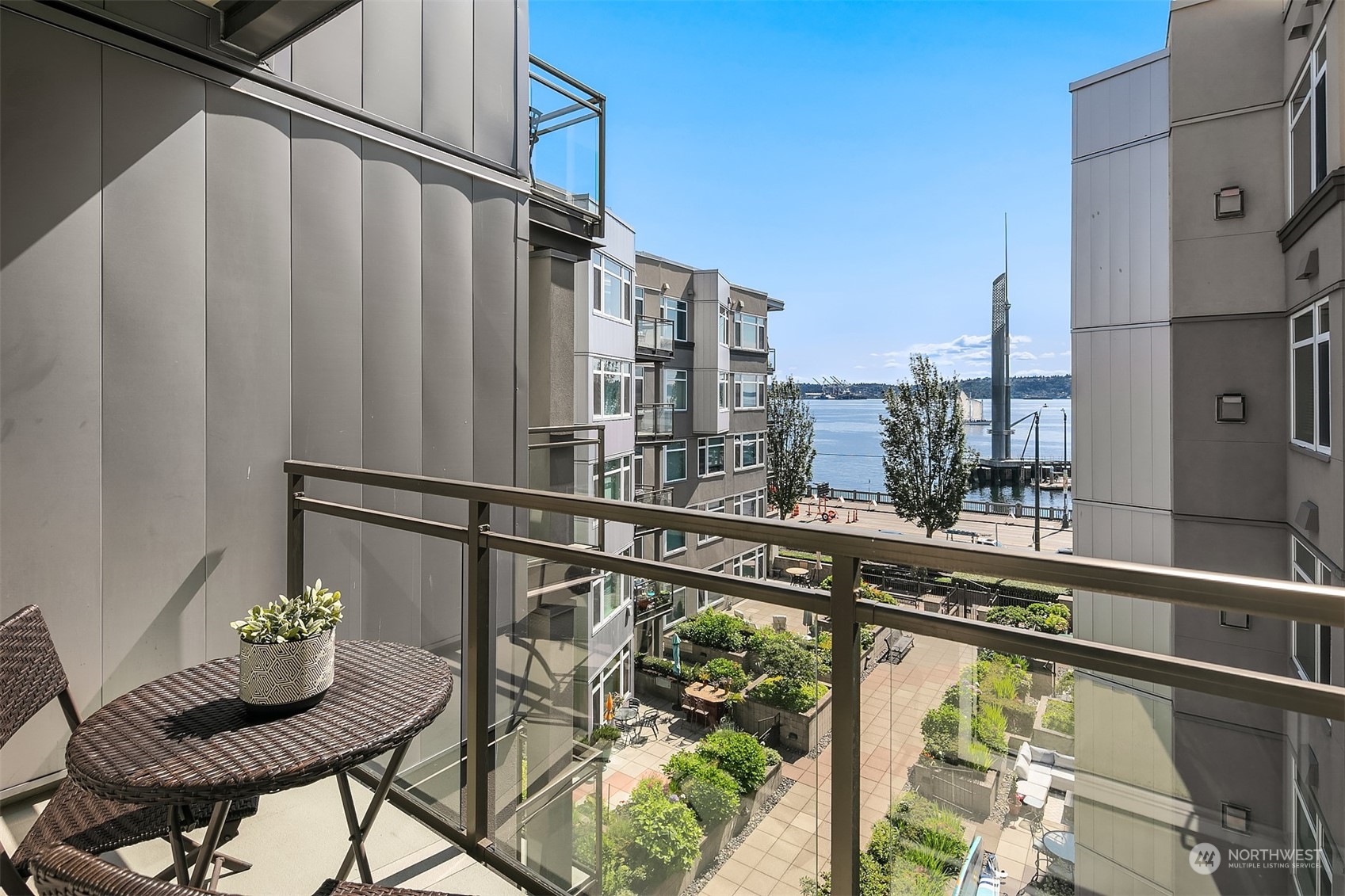 2000 Alaskan Way, Unit 442 Seattle, WA 98121 - Photo 6 of 23 a view of a balcony with chairs