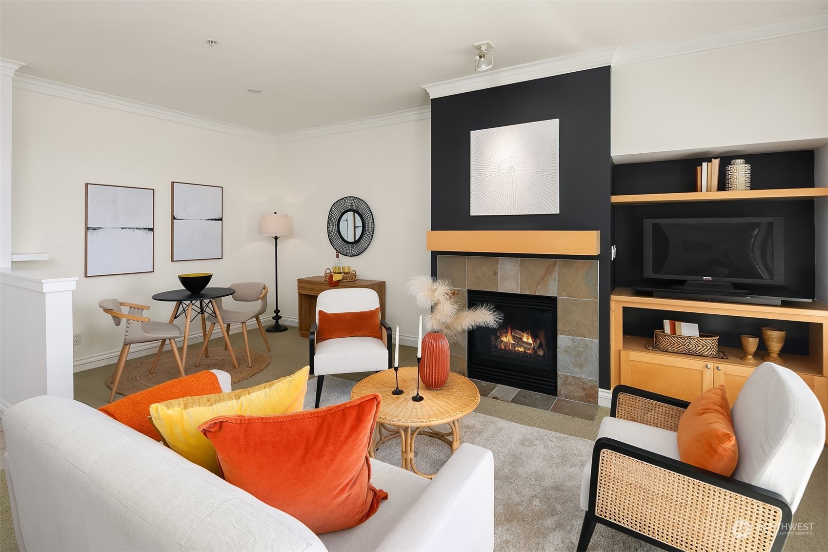 2000 Alaskan Way, Unit 442 Seattle, WA 98121 - Photo 7 of 23 a living room with furniture and a fireplace