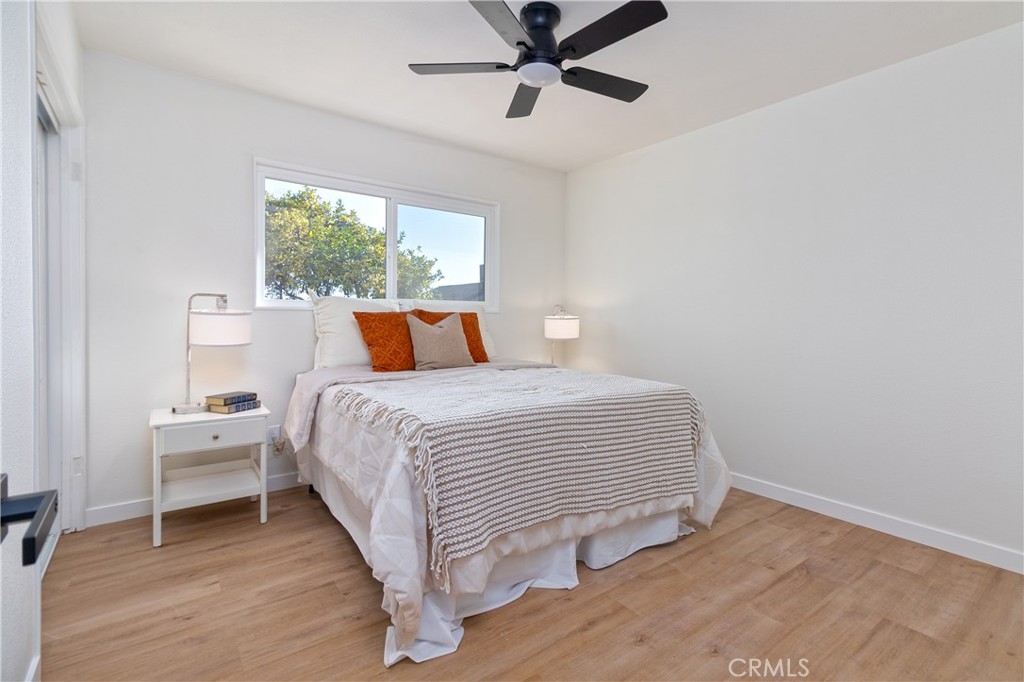 3306 Debbie Lane Riverside, CA 92501 - Photo 16 of 32 a bedroom with a bed and window
