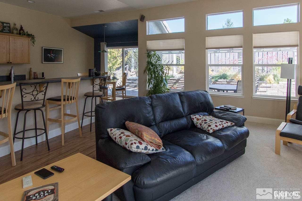 9760 Frankwood Drive Reno, NV 89521 - Photo 15 of 24 a living room with furniture and a large window