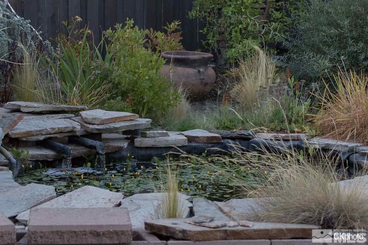 9760 Frankwood Drive Reno, NV 89521 - Photo 23 of 24 a view of a backyard with plants and outdoor seating
