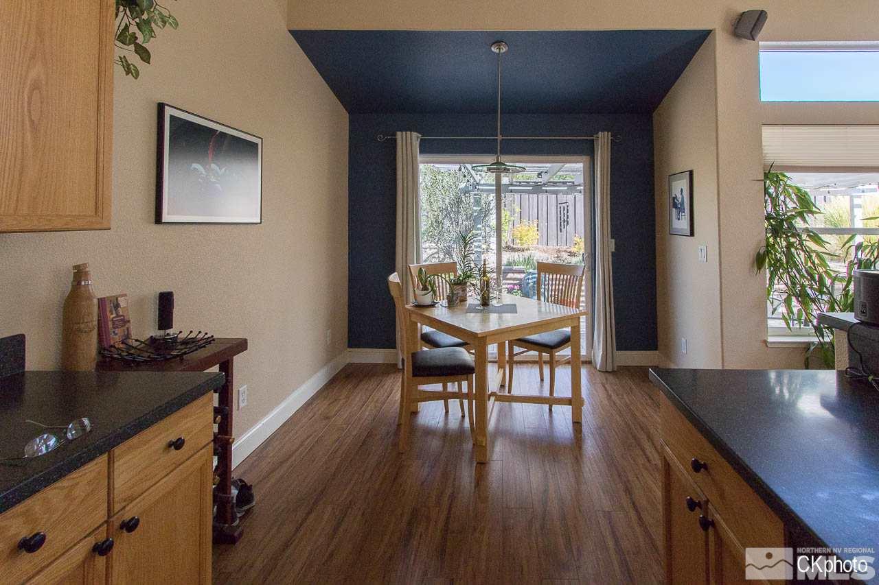 9760 Frankwood Drive Reno, NV 89521 - Photo 6 of 24 a dining room with furniture and wooden floor