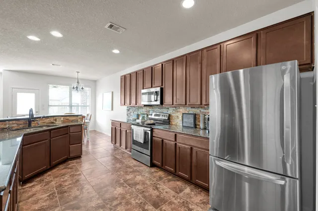 $425,000 | 9972 Western Ridge Way, Conroe, TX 77385