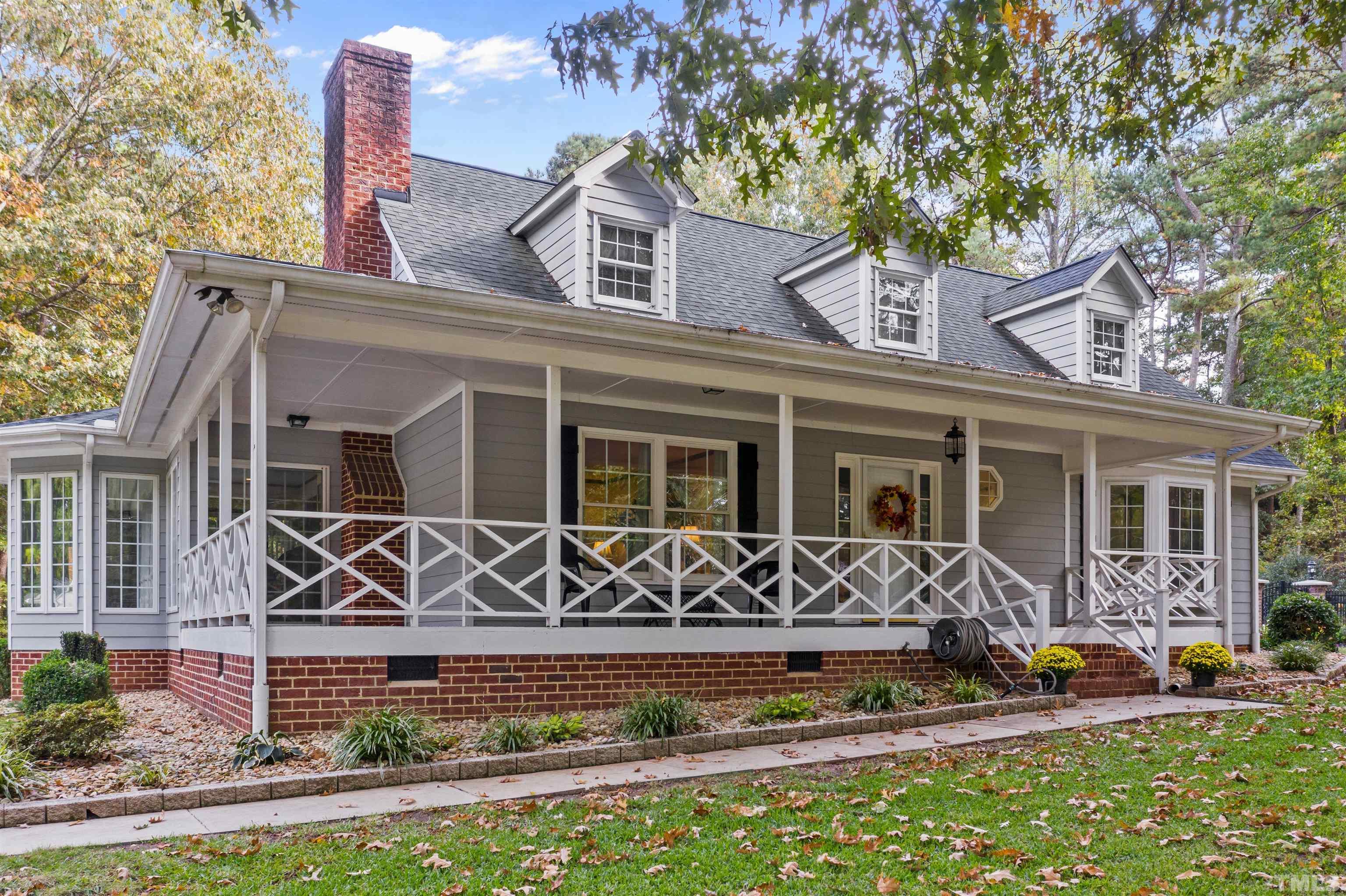 8417 Crowder Road Raleigh, NC 27603 - Photo 2 of 30 front view of a house with a yard