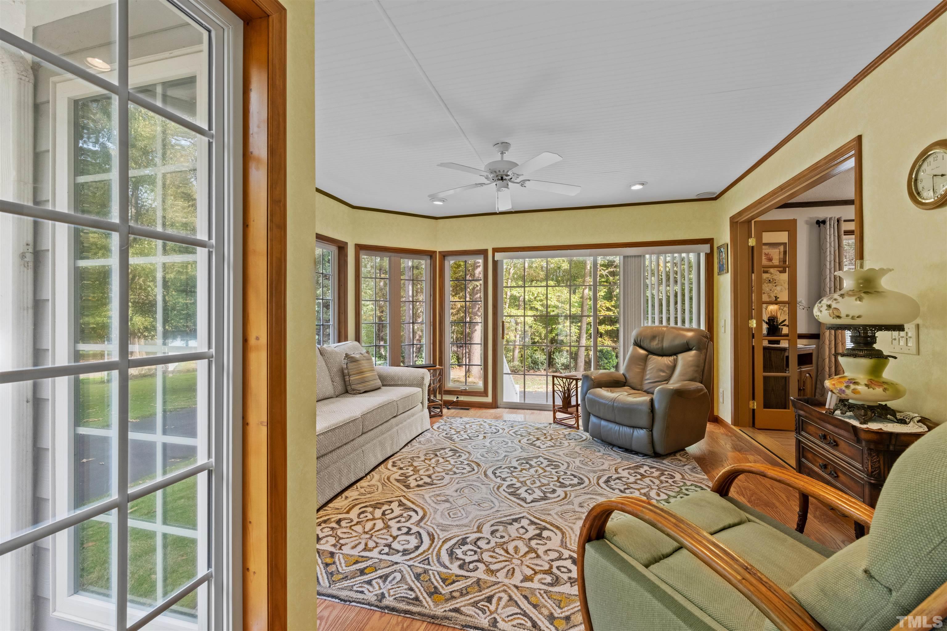 8417 Crowder Road Raleigh, NC 27603 - Photo 13 of 30 a living room with furniture and a large window