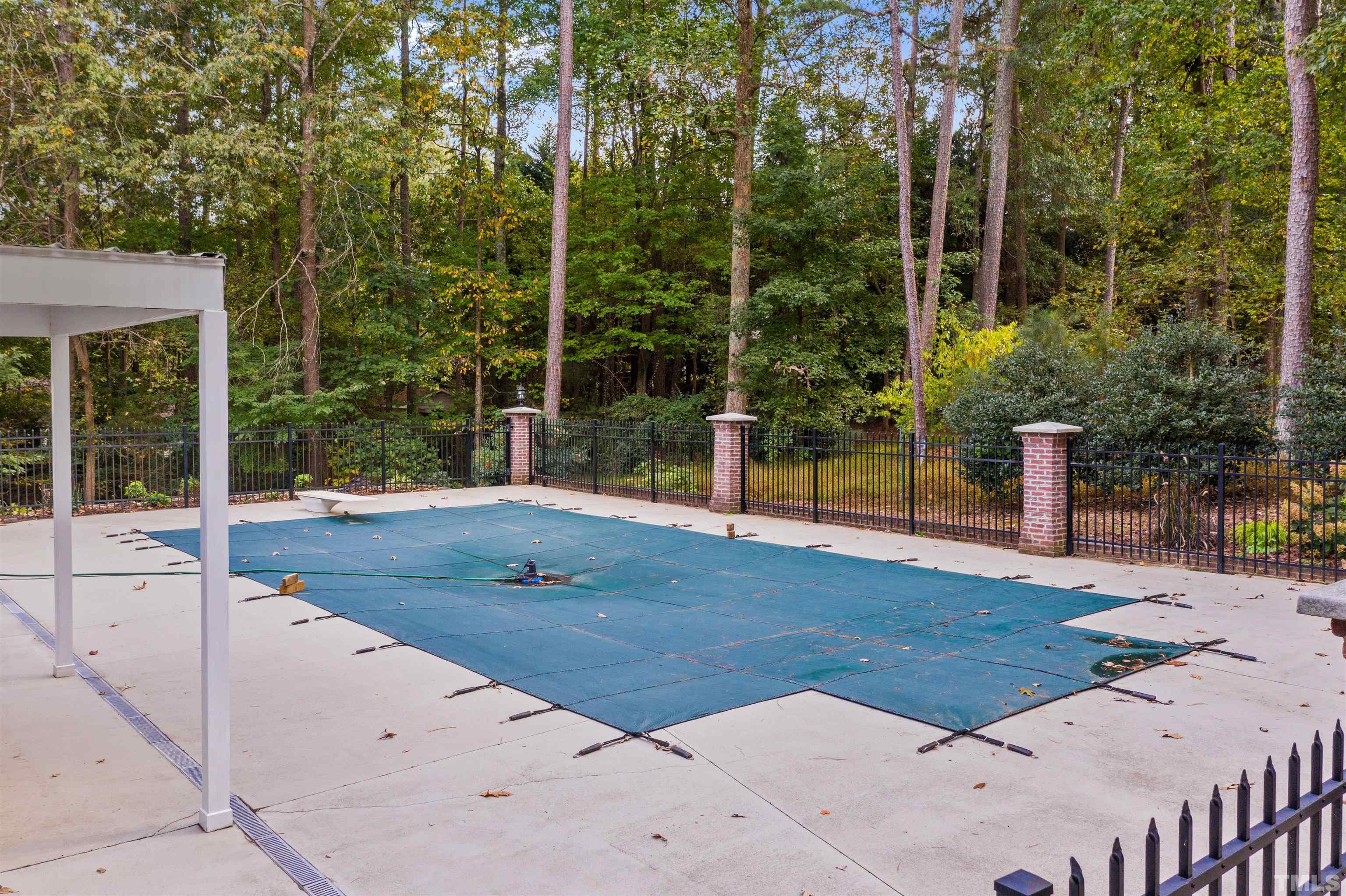 8417 Crowder Road Raleigh, NC 27603 - Photo 28 of 30 a view of a house with backyard and sitting area