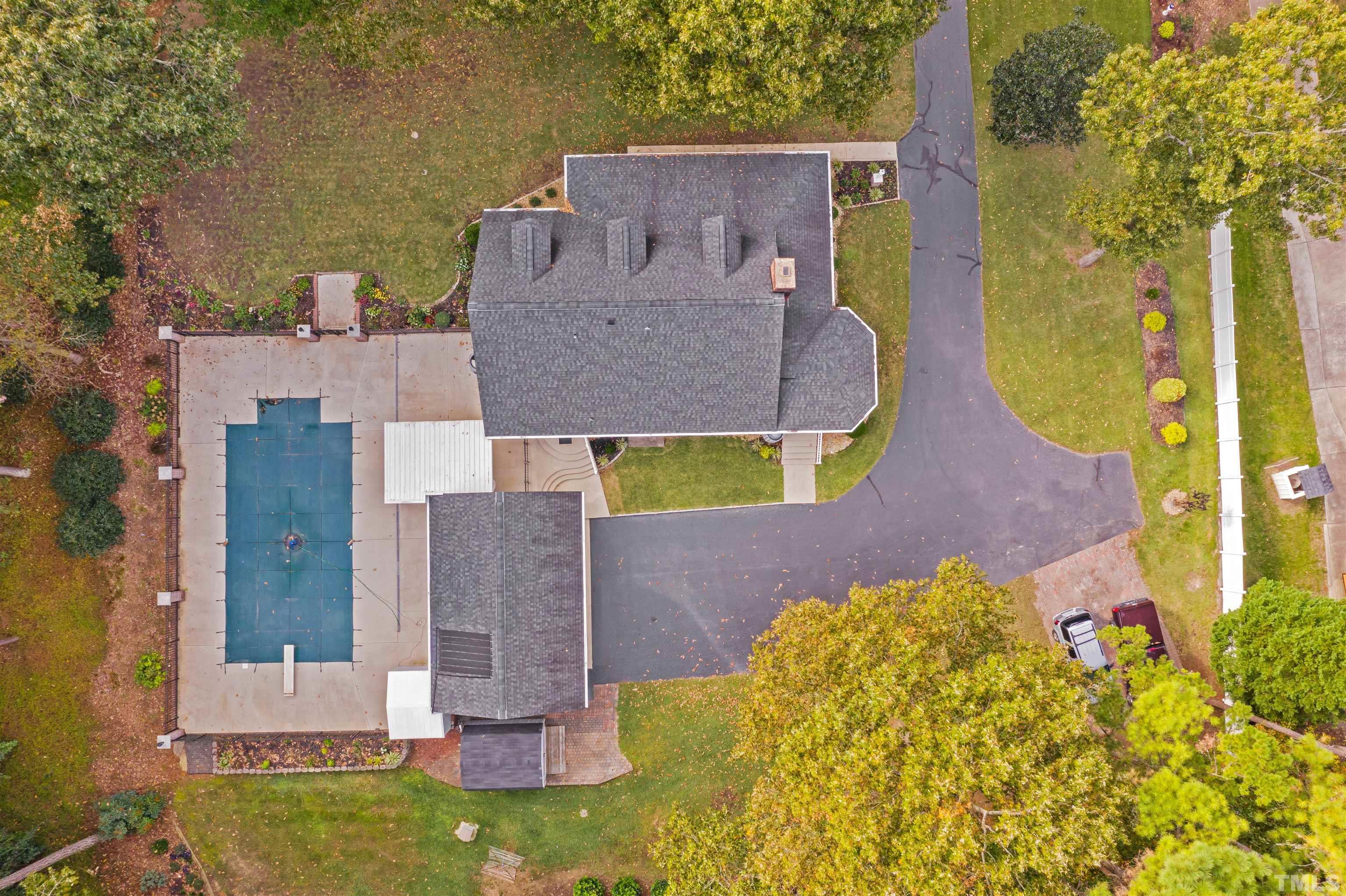 8417 Crowder Road Raleigh, NC 27603 - Photo 6 of 30 aerial view of a house with a swimming pool