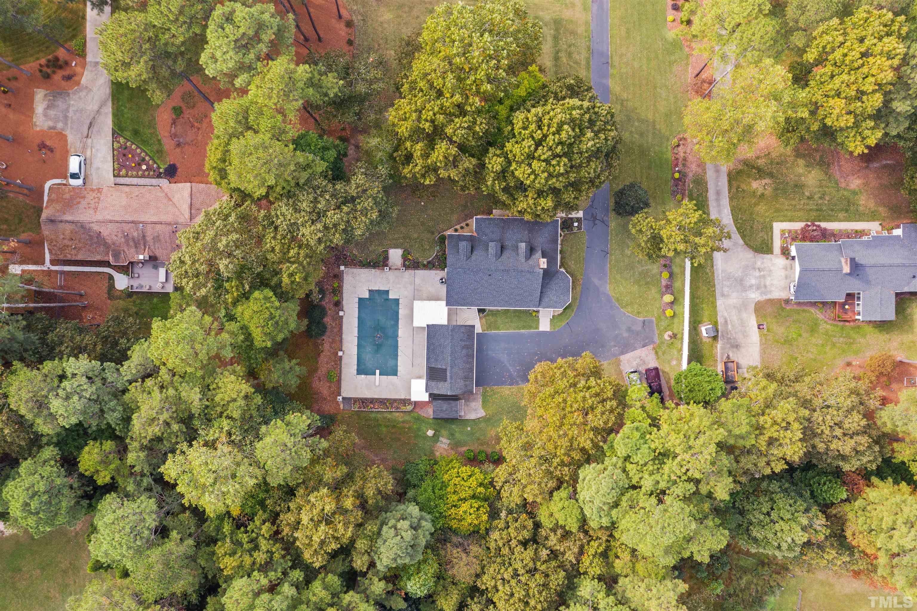 8417 Crowder Road Raleigh, NC 27603 - Photo 7 of 30 an aerial view of a house with a yard basket ball court and outdoor seating