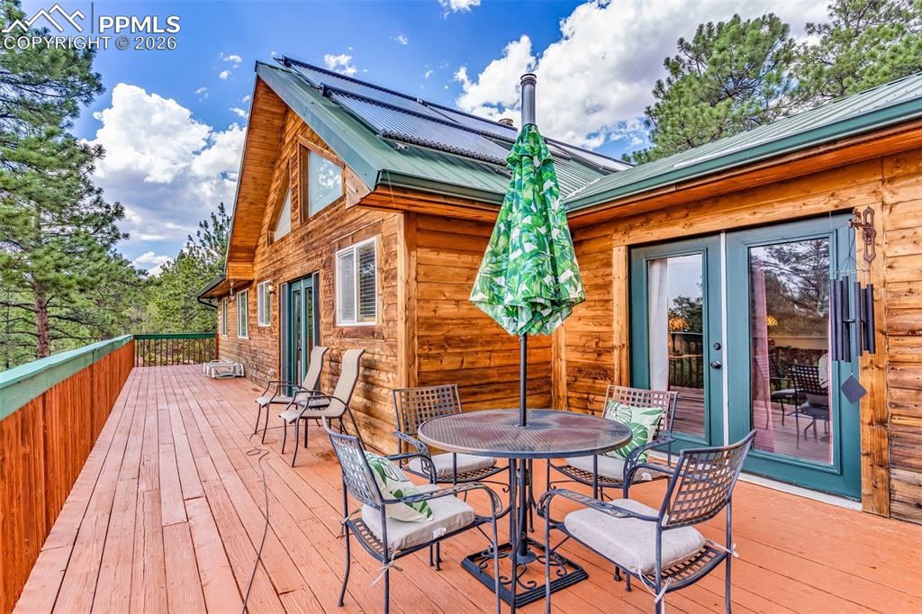 209 Rosewood Road Westcliffe, CO 81252 - Photo 40 of 49 Huge back deck to take advantage of the incredible Sangre de Cristo mountain views! Walkouts from family room and primary suite.
