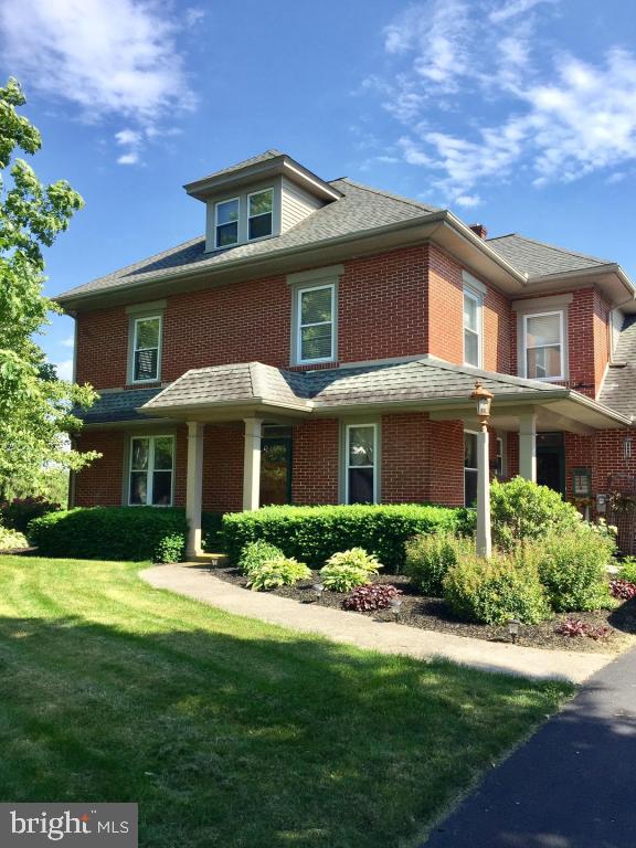 737 Penn Avenue Lititz, PA 17543 - Photo 2 of 35 a front view of a house with a yard