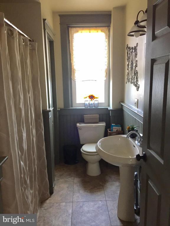 737 Penn Avenue Lititz, PA 17543 - Photo 25 of 35 a bathroom with a toilet a sink and a mirror