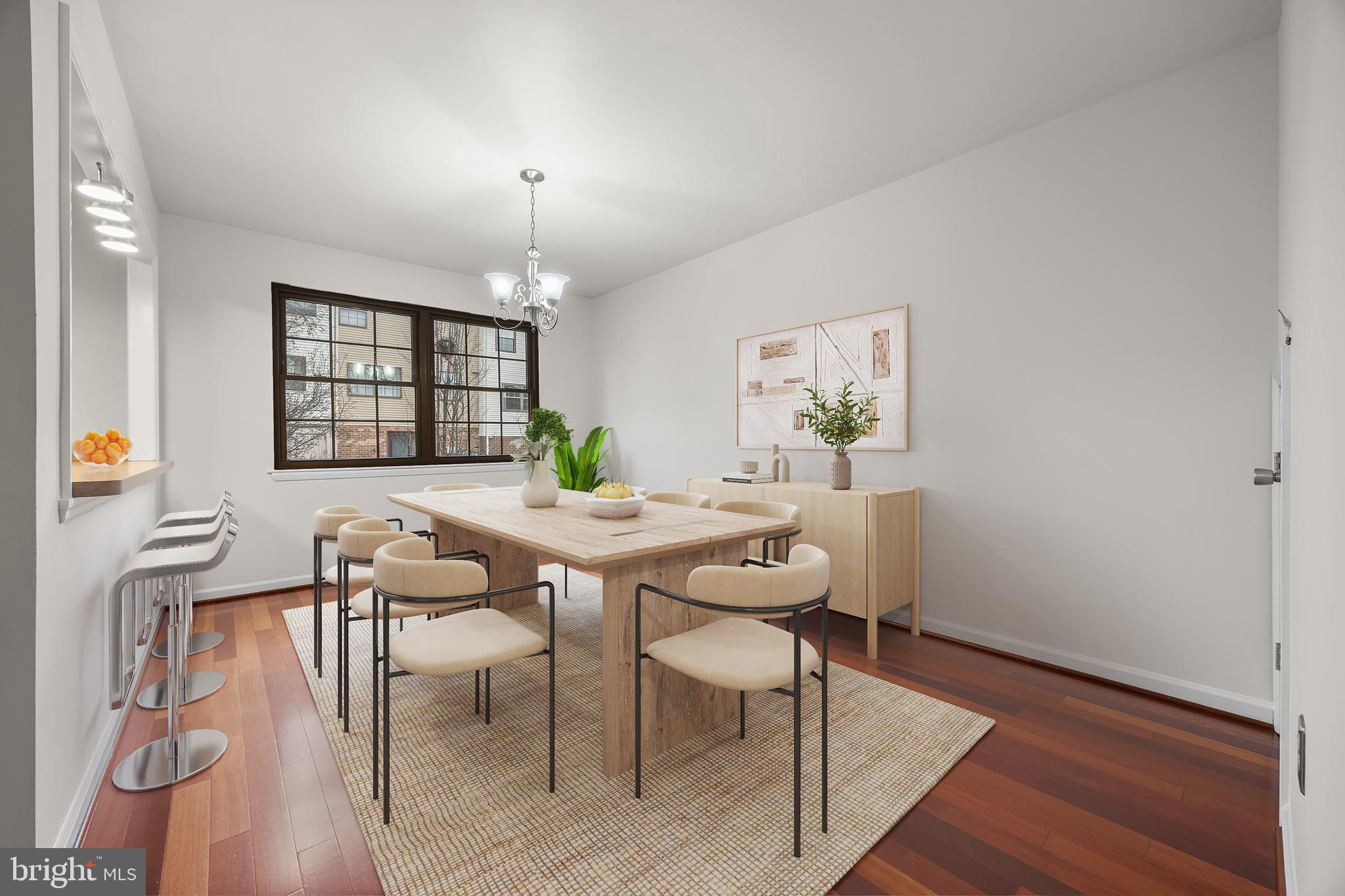33 Badger Gate Court Baltimore, MD 21228 - Photo 11 of 39 a view of a dining room with furniture and wooden floor
