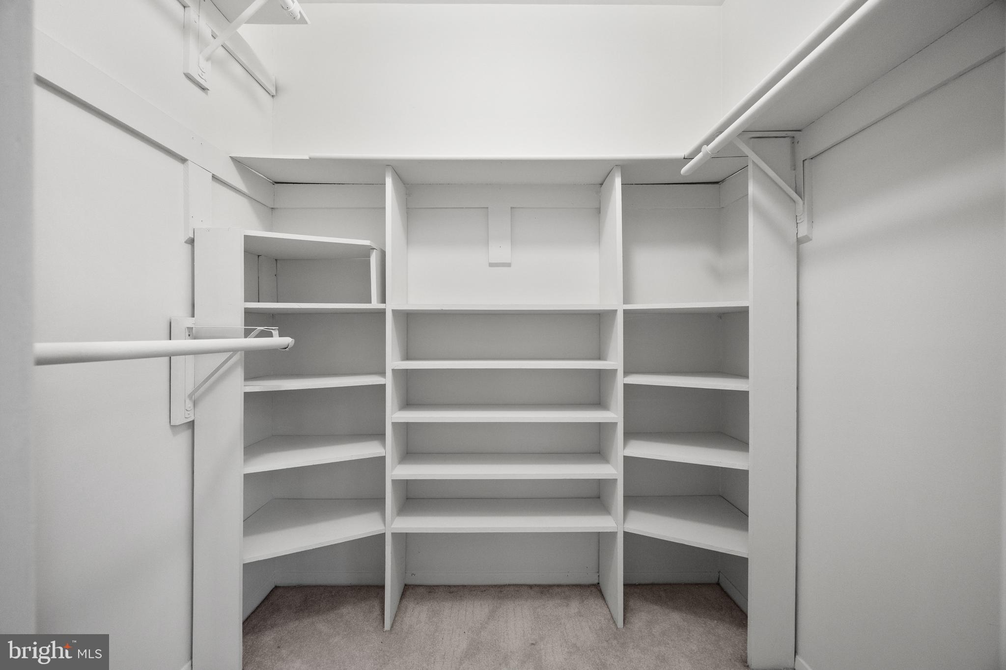 33 Badger Gate Court Baltimore, MD 21228 - Photo 24 of 39 a view of walk in closet with empty racks
