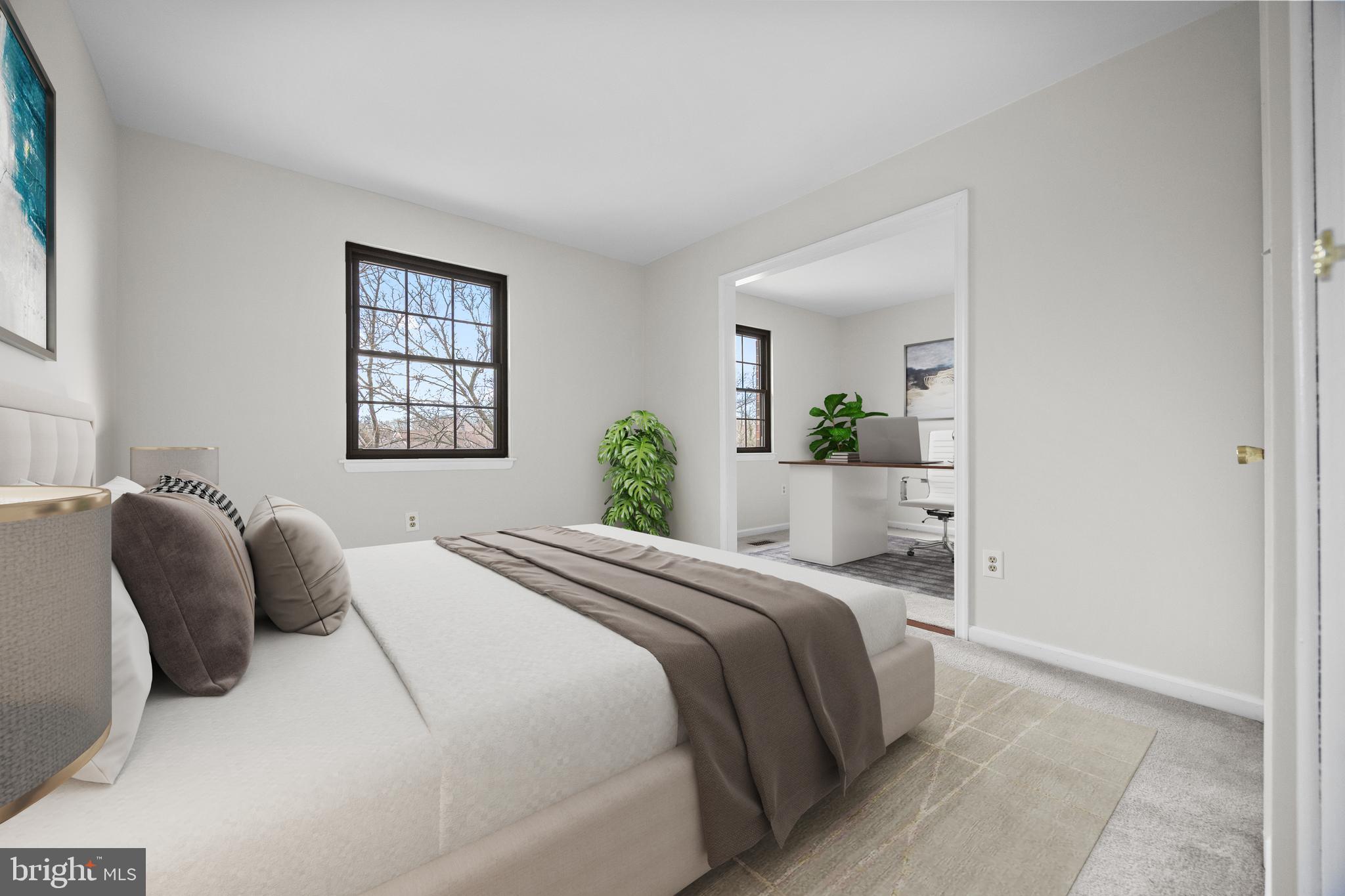 33 Badger Gate Court Baltimore, MD 21228 - Photo 26 of 39 a bedroom with a bed windows and cabinet