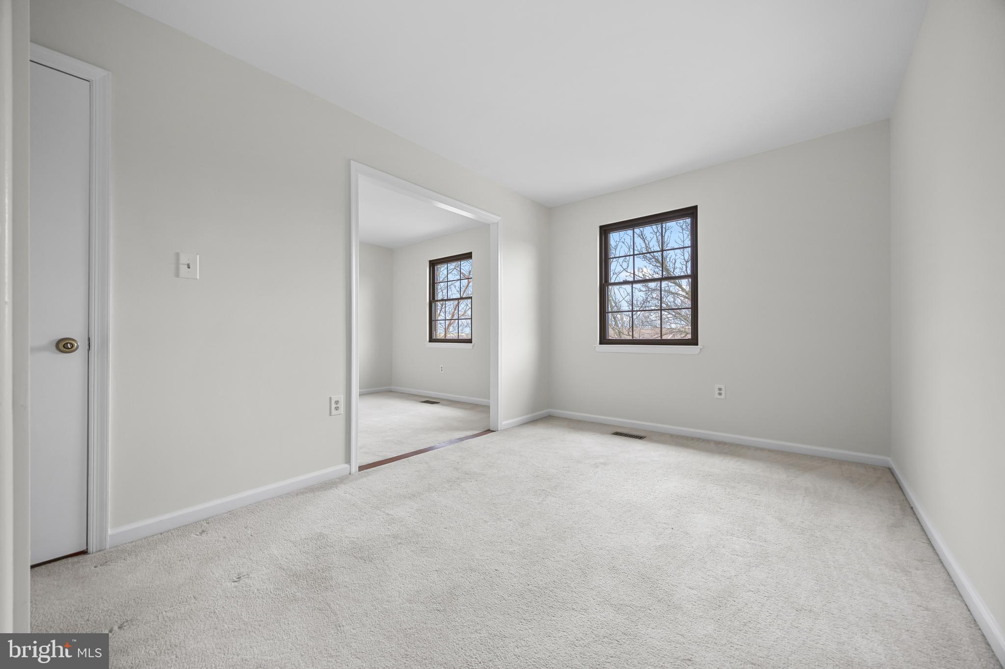 33 Badger Gate Court Baltimore, MD 21228 - Photo 30 of 39 an empty room with windows and closet