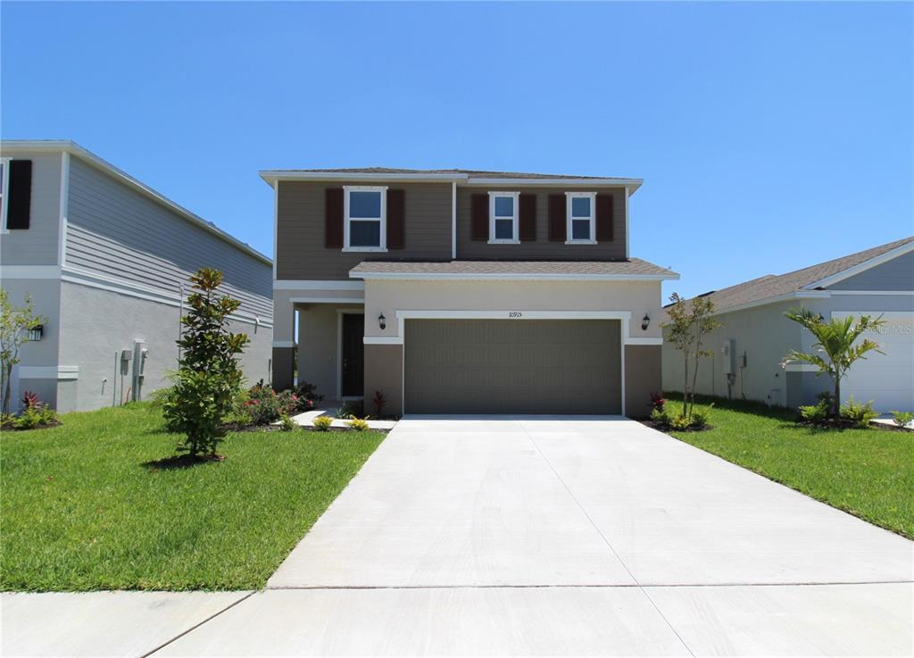 a front view of house with yard