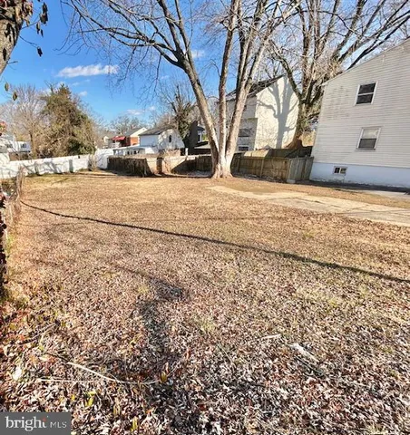 a view of snow on the side of the road