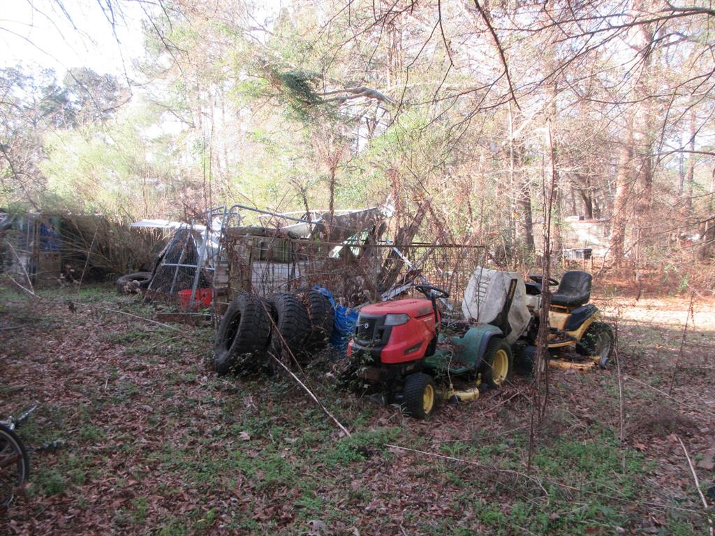 109 Amy Lane Minden, LA 71055 - Photo 5 of 8 a view of a yard with a tree