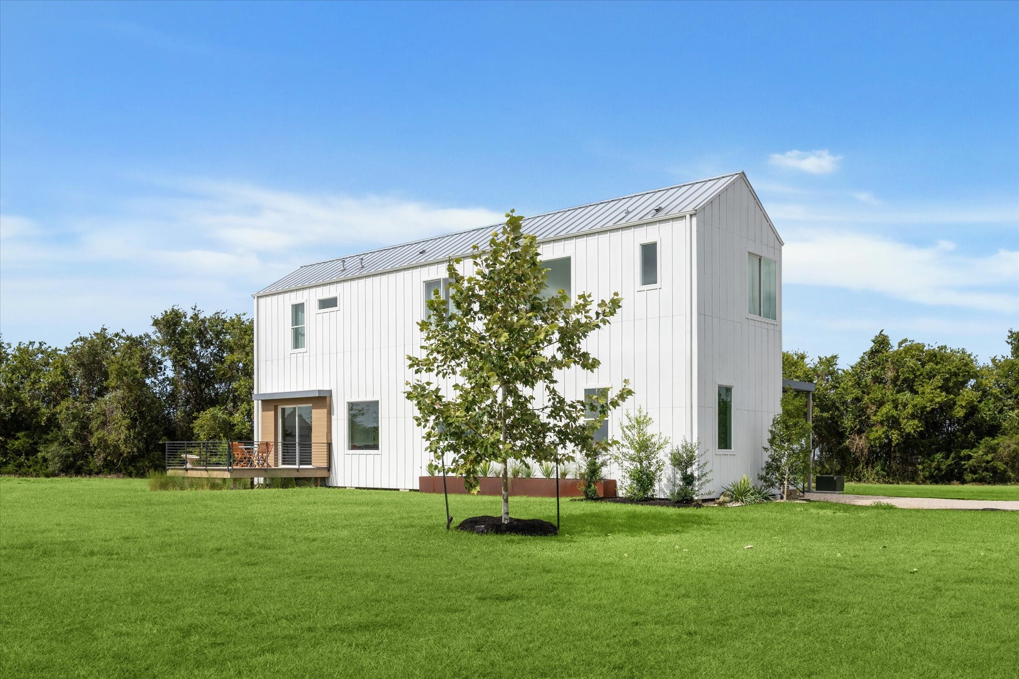 175 Vineyard View Trail Carmine, TX 78932 - Photo 17 of 27 a front view of a house with a garden