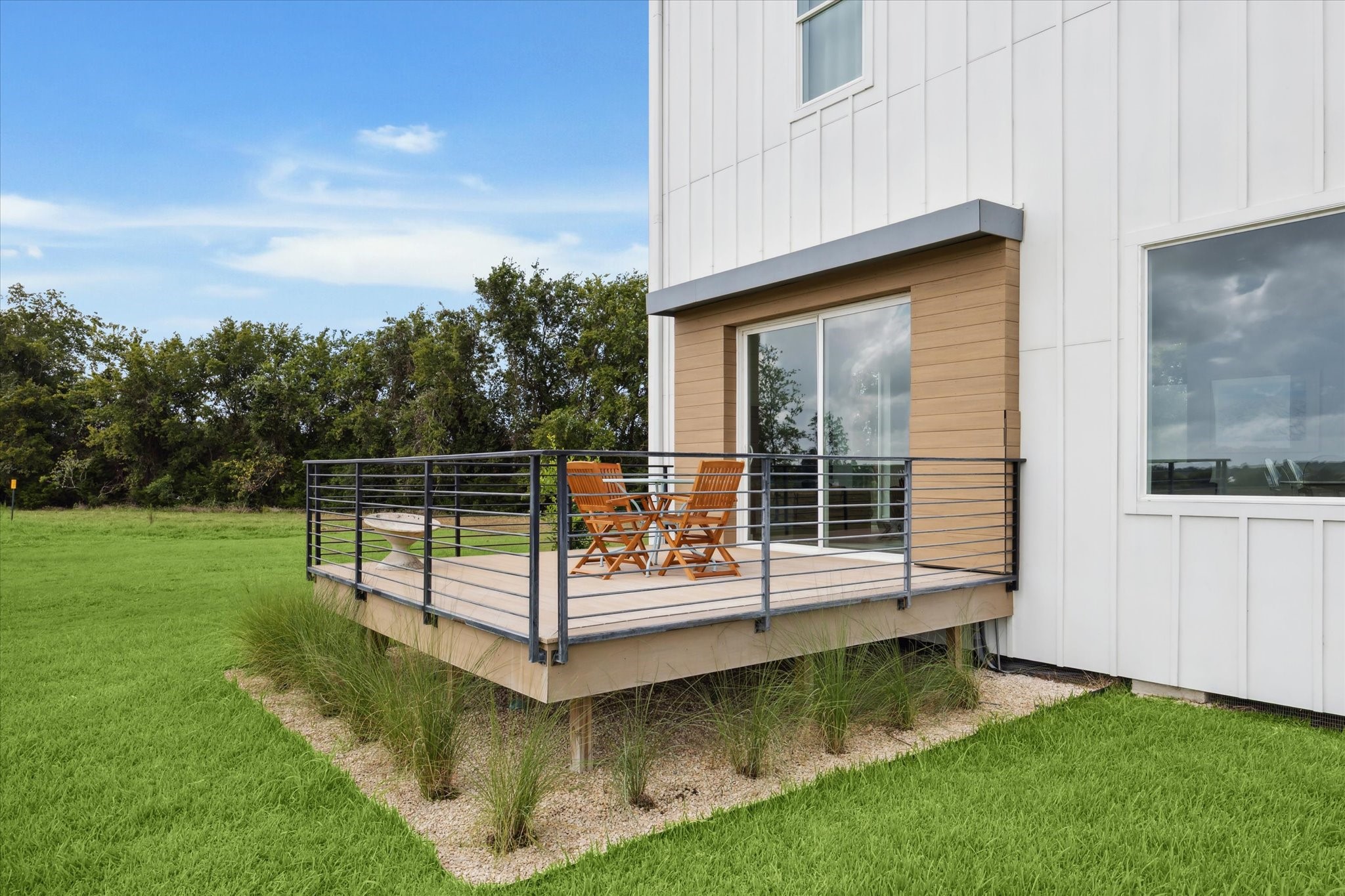175 Vineyard View Trail Carmine, TX 78932 - Photo 2 of 27 a view of a wooden deck with a yard
