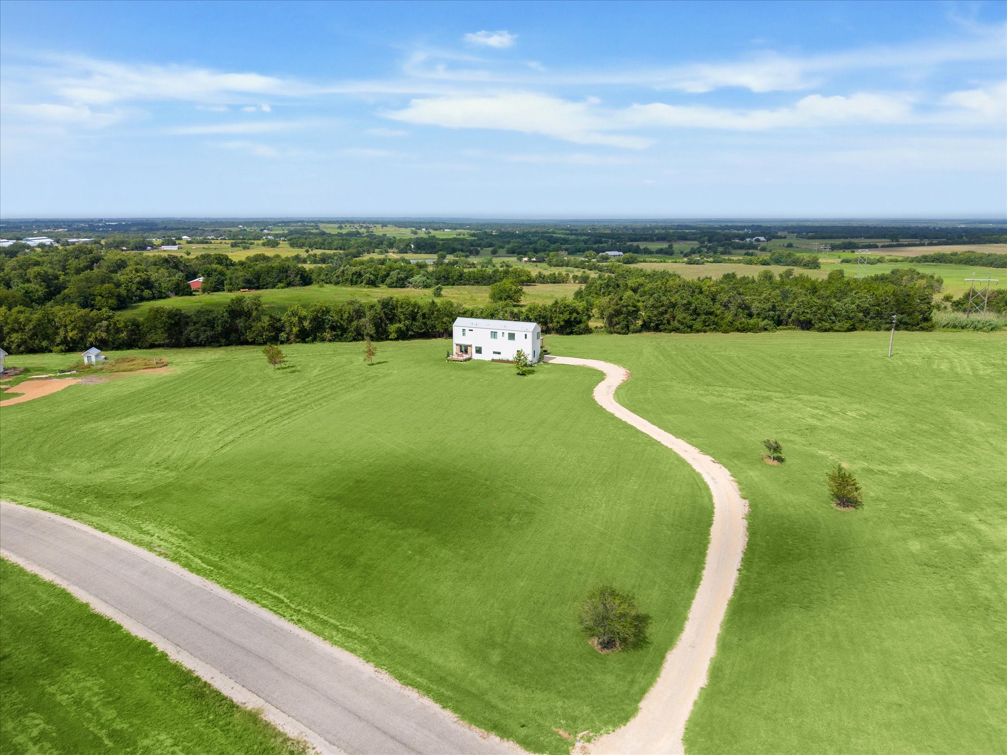 175 Vineyard View Trail Carmine, TX 78932 - Photo 21 of 27 a view of a big yard with a large trees