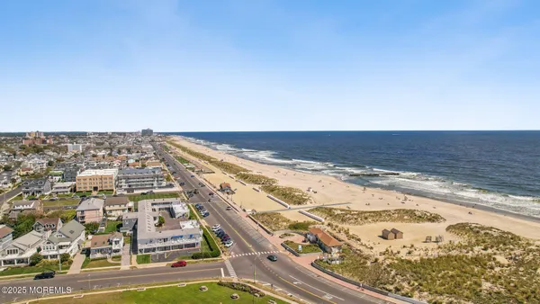 an aerial view of beach and ocean