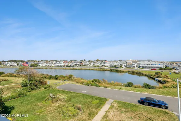a view of an ocean and city