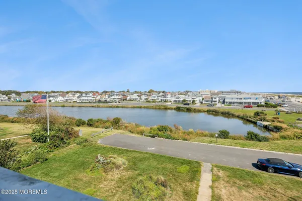 a view of a lake with a city view
