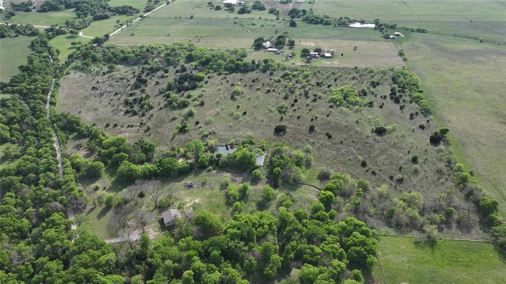 1 Hcr 1136 Rio Vista Rio Vista, TX 76093 - Photo 4 of 7 an aerial view of beach with trees all around
