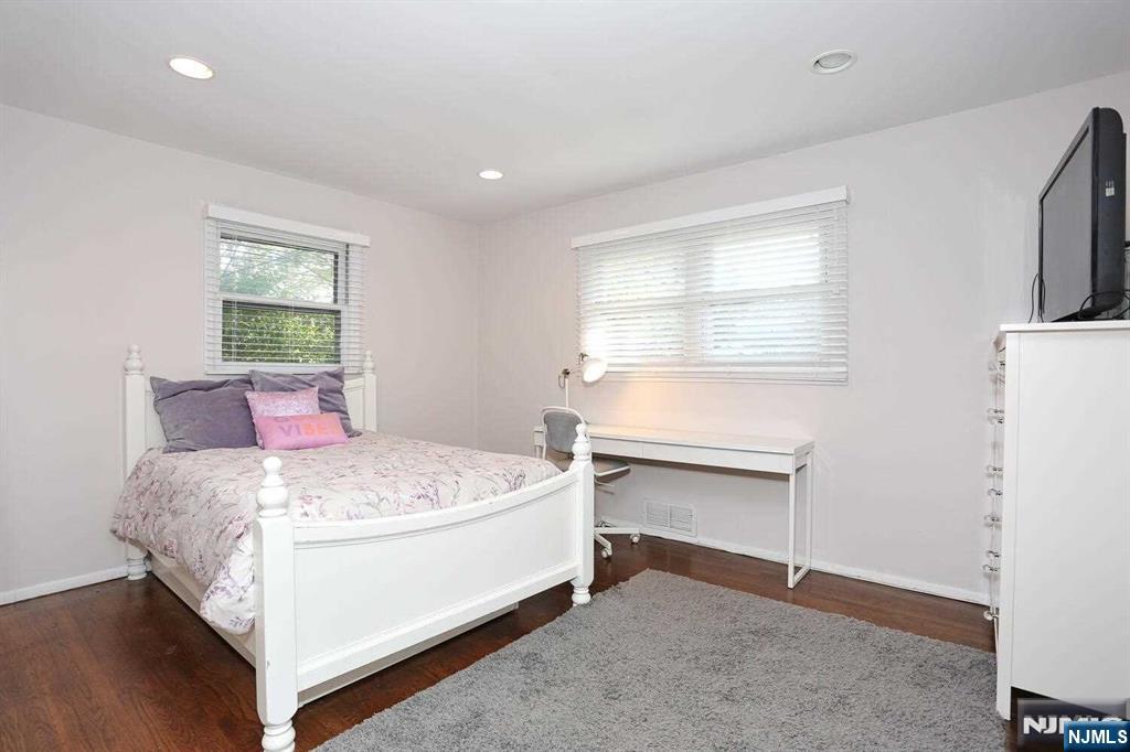 11 Evans Road Cresskill, NJ 07626 - Photo 19 of 31 a bedroom with a bed and window
