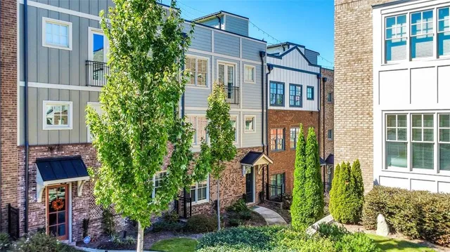 a front view of a multi story residential apartment building