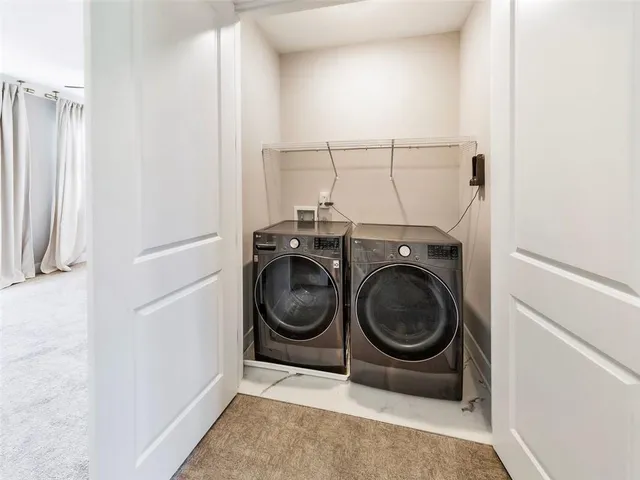 a view of a kitchen from the hallway