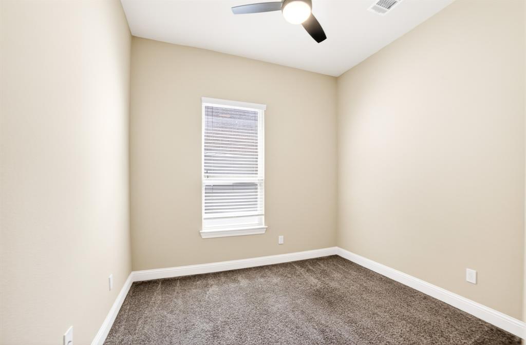 552 Winnetka Drive Oak Point, TX 75068 - Photo 15 of 40 an empty room with a window